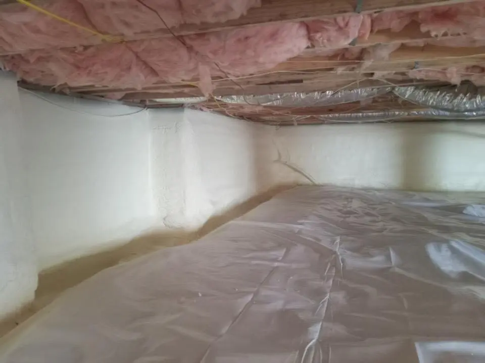 Crawl space encapsulation with closed-cell spray foam for Storm Damage Roof Repair in Champion Heights